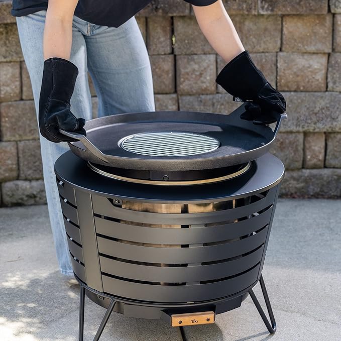 TIKI Fire Pit Griddle & Grill Combo – Cast Iron Cooking Surface for 16"-21" Smokeless Fire Pits – Outdoor BBQ Griddle for Camping & Patio – Includes Trivet & Heat-Resistant Gloves, Black