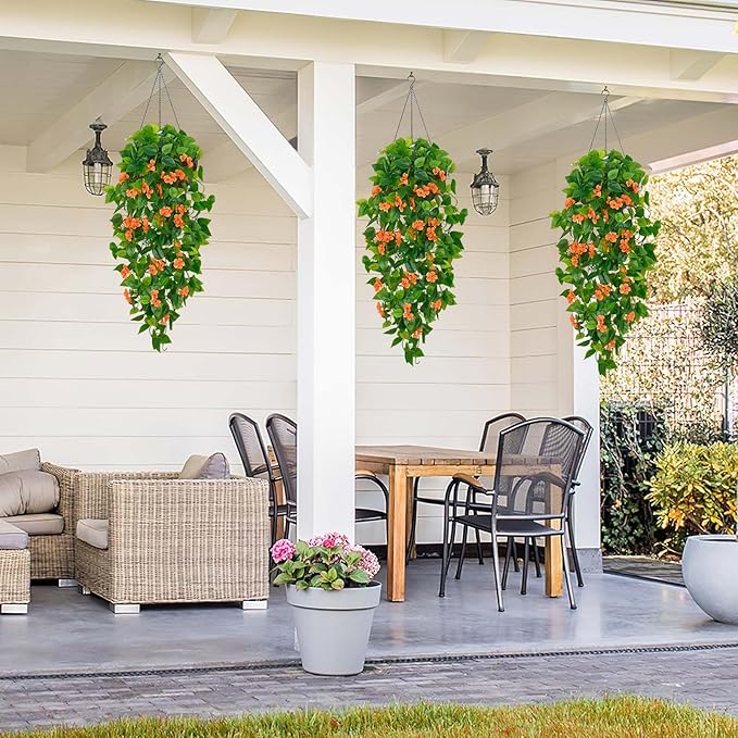 BLEUM CADE Artificial Hanging Flowers for Outdoors, 2pcs Fake Hanging Plants Pothos Vines with Orange Flowers for Wall Home Living Room Indoor Outdoor Fall Decor (No Baskets)
